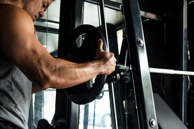 Smith Machine vs Power Rack: Which Is Right for Your Home Gym? - Fray Fitness